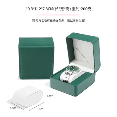 Closed watch boxes in navy and champagne gold colors showing rounded corner profile