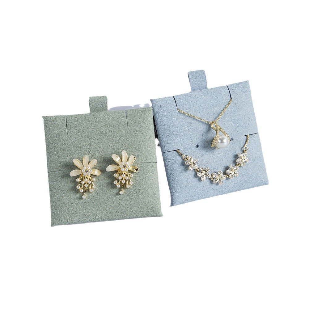Soft earring insert cards with jewelry attached