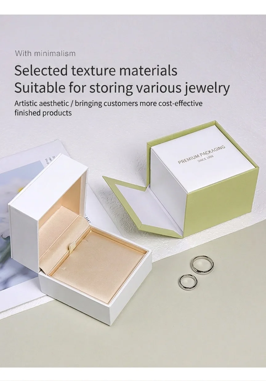 Minimalist green specialty-paper jewelry box open beside its lid, showing the silk interior - selected texture materials suitable for storing various jewelry