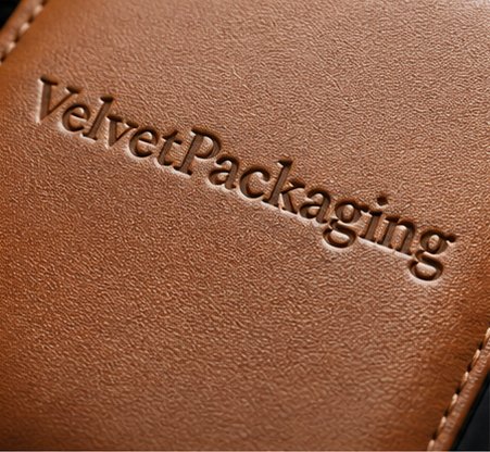 Debossed logo on brown leather jewelry packaging
