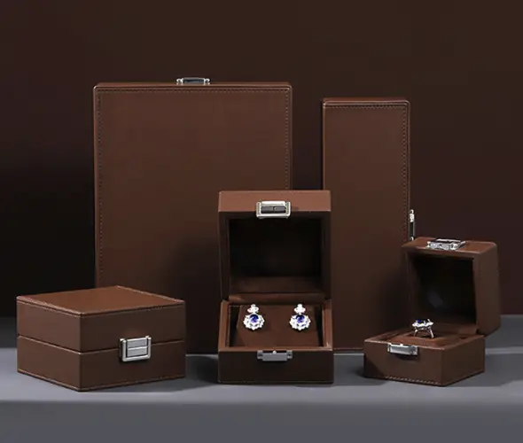 Brown luxury jewelry cases with metal clasp