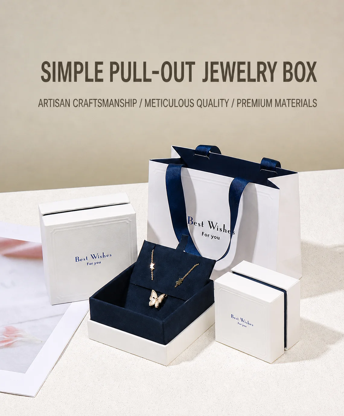 White and navy specialty-paper jewelry packaging collection with ring box, pendant box and matching handle gift bag under the headline Simple Pull-Out Jewelry Box